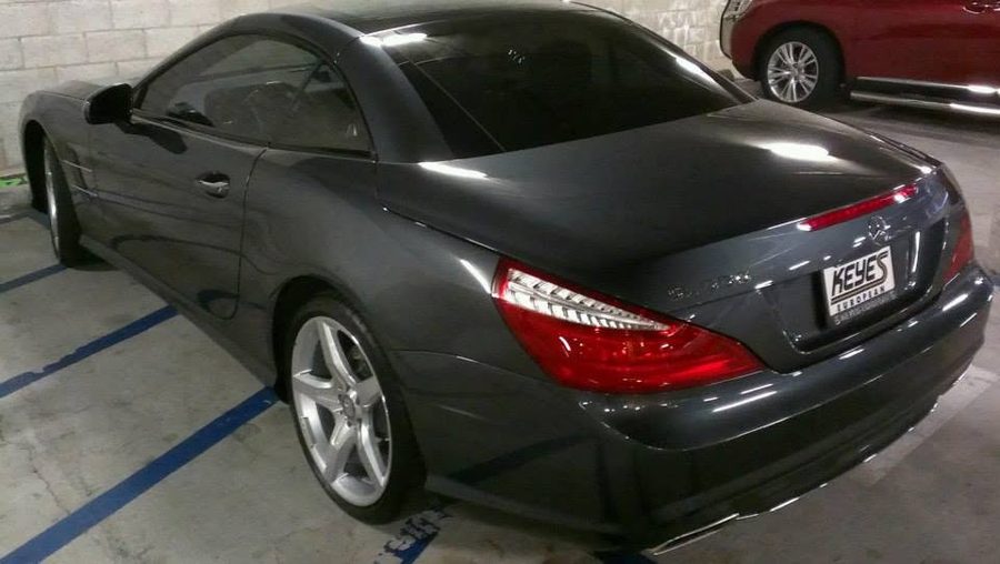 Black luxury convertible with tinted windows by TNT Window Tinting